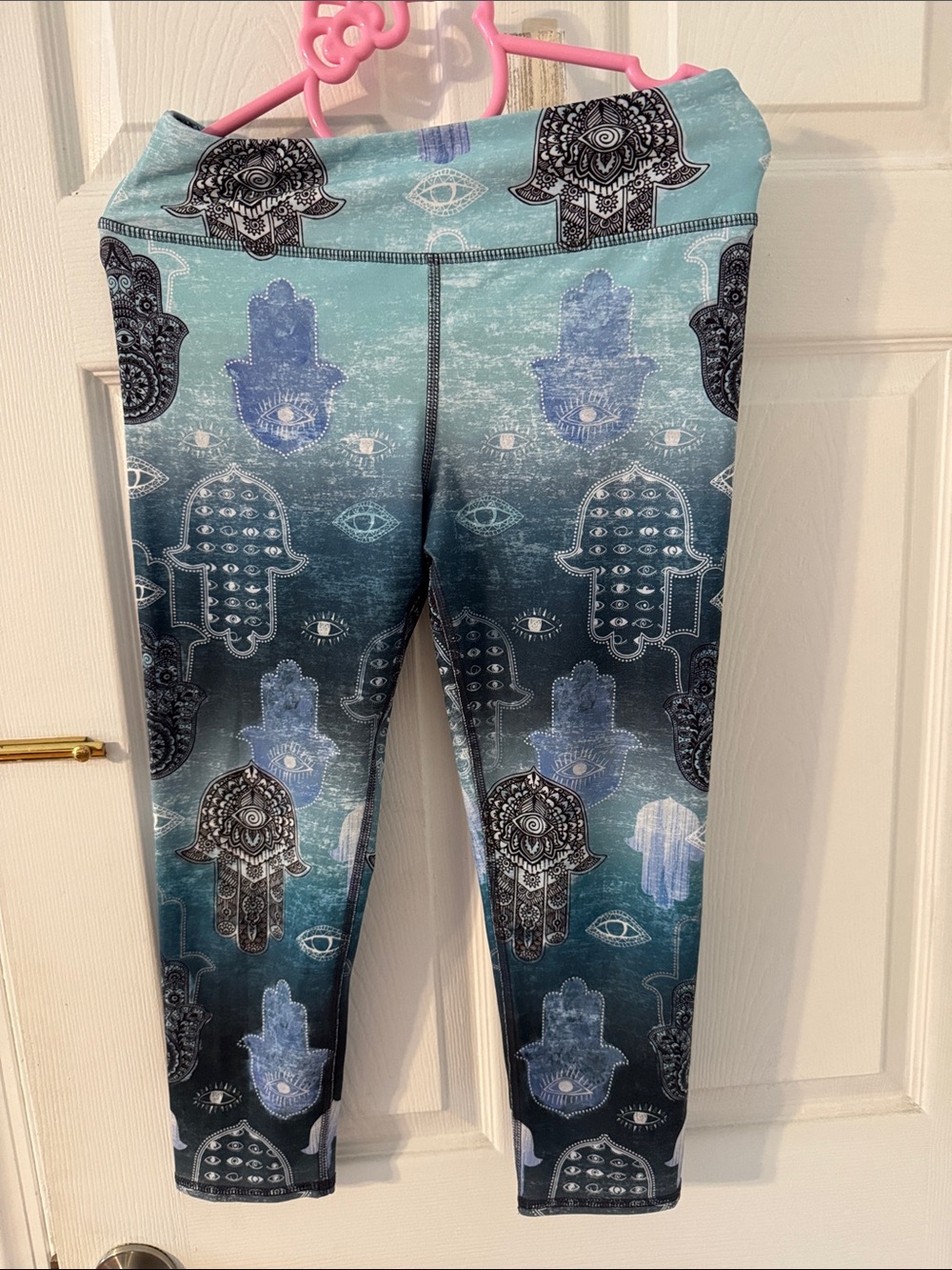 Evolution and Creation Teal and Black Hamsa Print Leggings
